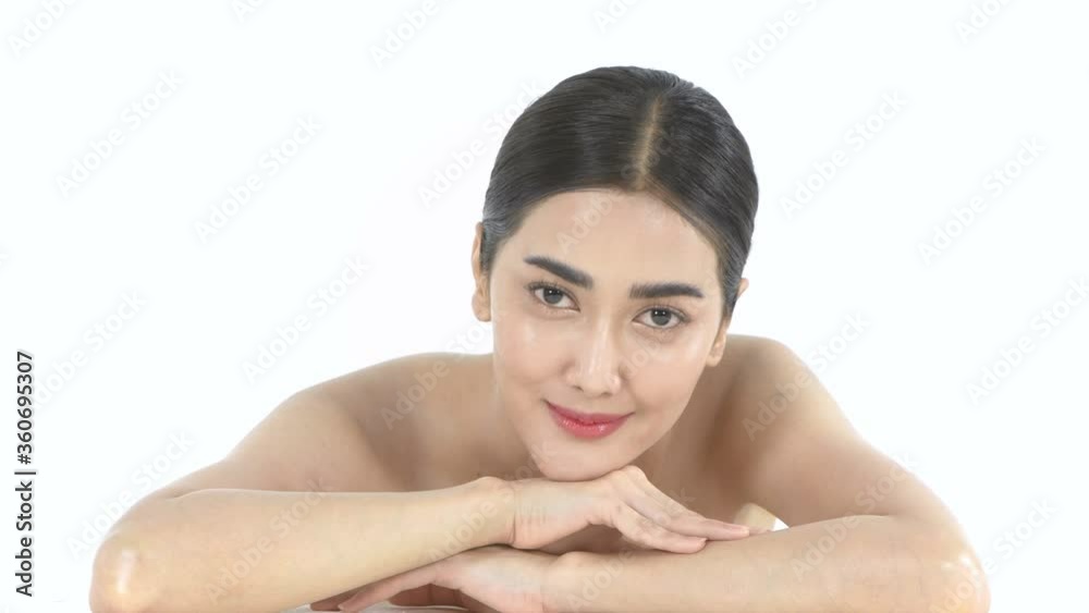 Beauty concept. An asian woman smiling on a white background. 4k Resolution. Beauty concept. An asian woman smiling on a white background. 4k Resolution.