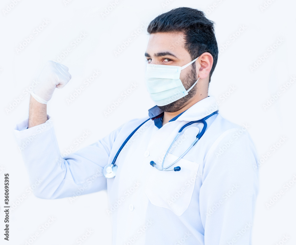 Arabic doctor feeling strong while wearing protection gear Arabic doctor feeling strong while wearing protection gear