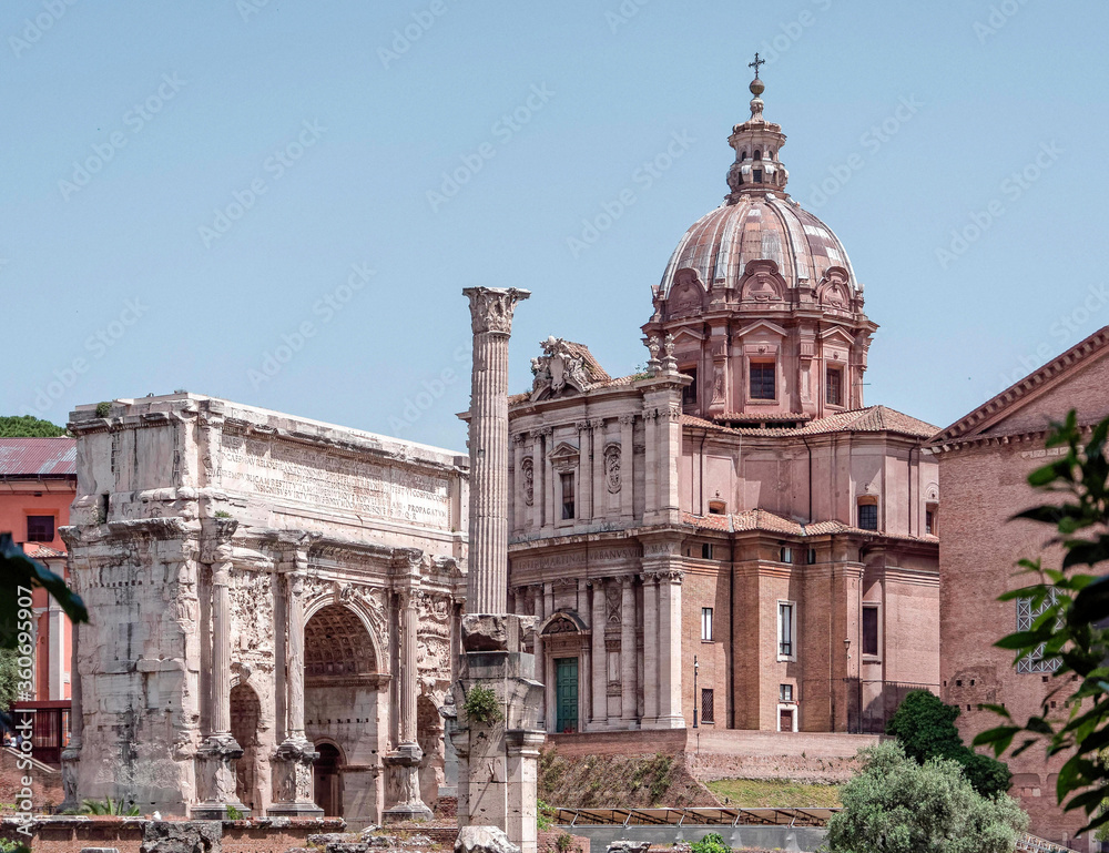 famous Septimius Severus triumph arch in front of St. Luca and Martina church domus, Rome Italy