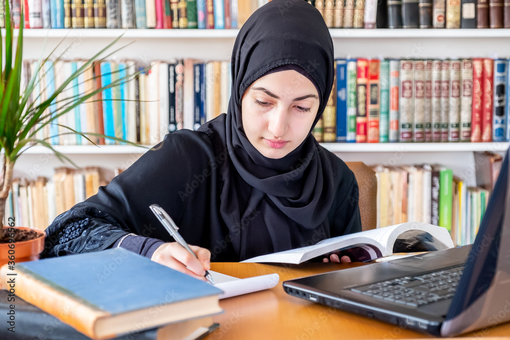 Arabic muslim woman studying online Arabic muslim woman studying online