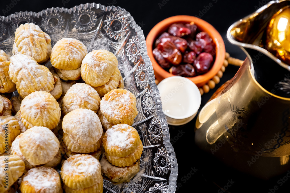 Eid sweets with coffee and date