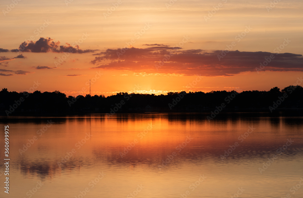 Michigan summer sunrise. Upper Crooked Lake