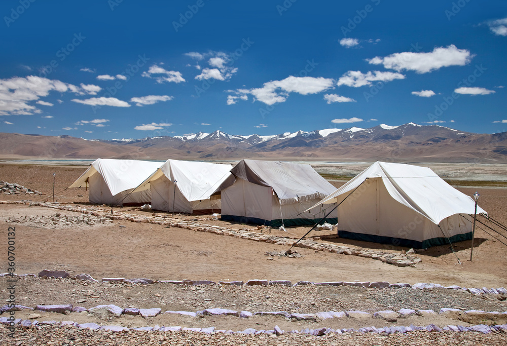 Camping tents near Tso Moriri lake in Changthang Plateau in Ladakh, Jammu and Kashmir, North India