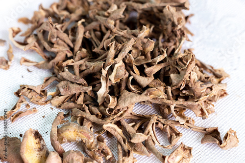 Dried potato peeling on a white background