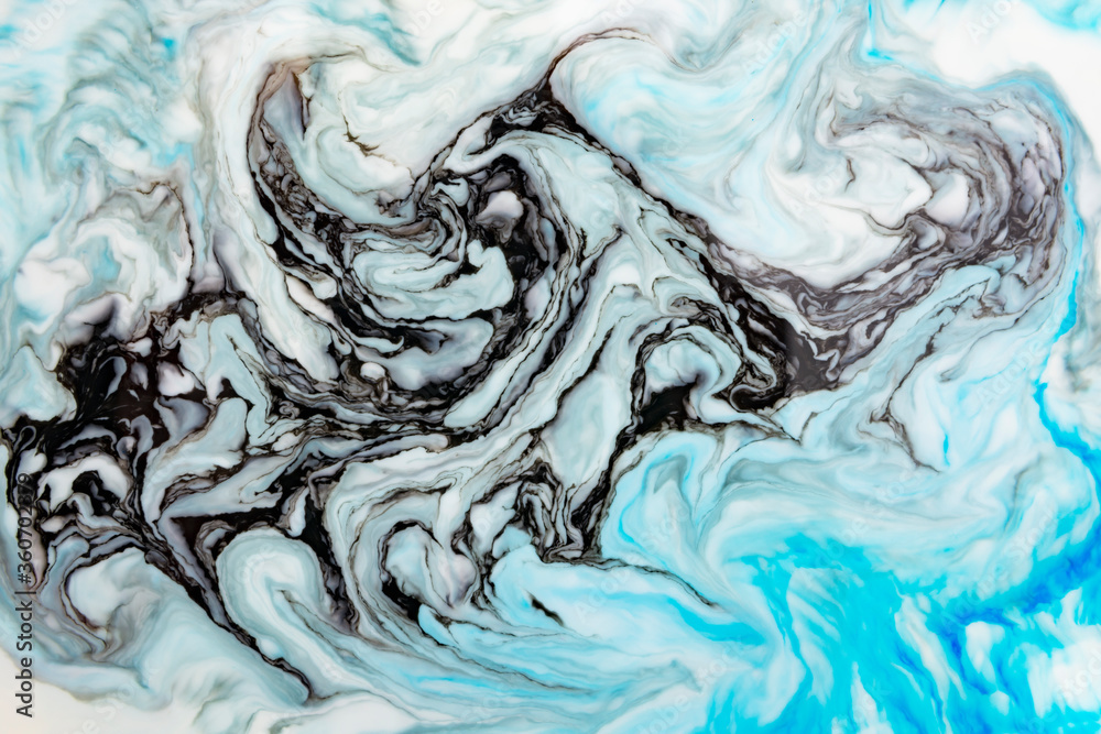 The background is painted blue in the Ebru style The background is painted blue in the Ebru style