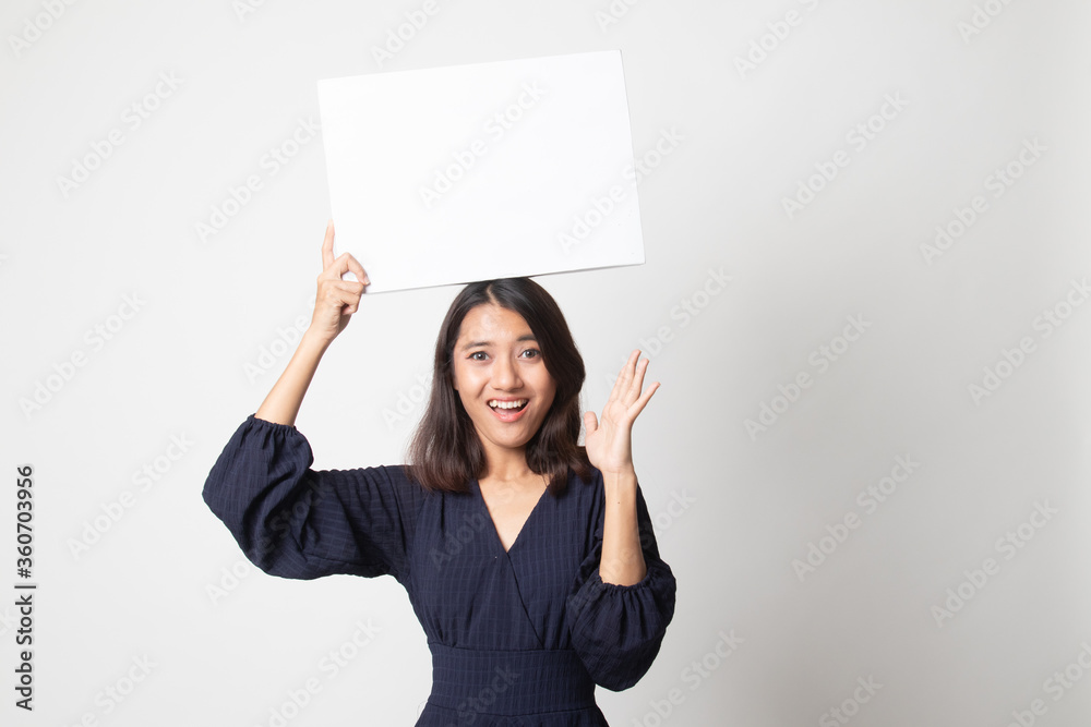 Young Asian woman surprise with white blank sign. Young Asian woman surprise with white blank sign.
