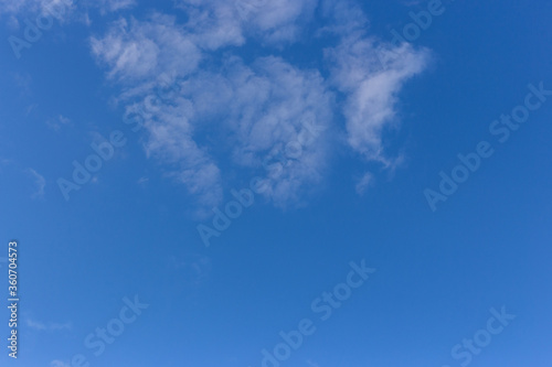 White clouds on a blue blue sky.