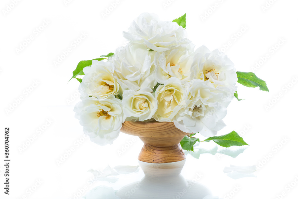 bouquet of beautiful summer white roses on white background