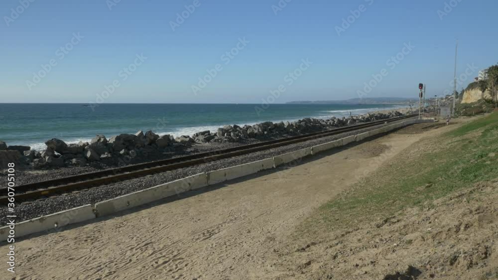 Pacific surfliner rails at beautiful landscapes at summer day in california san clemente calafia beach. orange county lifestyle Pacific surfliner rails at beautiful landscapes at summer day in california san clemente calafia beach. orange county lifestyle