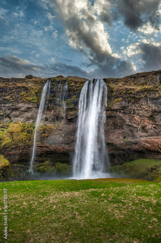Seljalandsfoss - Seljalandsfoss is located in the southern region of Iceland, just off Highway 1. One of the cool things about this waterfall is that visitors can walk behind it into a small cave.