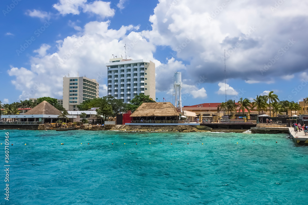 The coastline and port with blue caribbean water at Cozumel, Mexico
