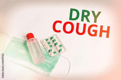 Handwriting text Dry Cough. Conceptual photo cough that are not accompanied by phlegm production or mucus Primary medical precautionary equipments for health care protection photo