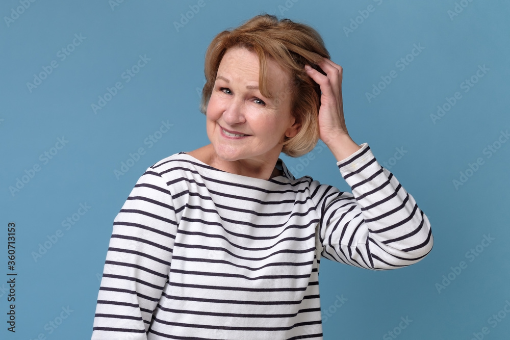 Happy confident old senior woman smiling looking at camera. Positive facial human emotion. Happy confident old senior woman smiling looking at camera. Positive facial human emotion.