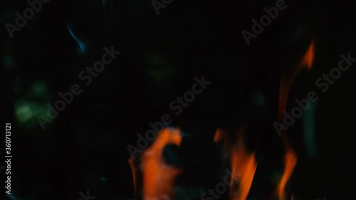 Tongues of flame and puffs of smoke.