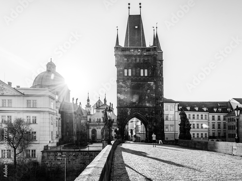 Morning on Charles Bridge  Czech  Karluv most. Hazy sunrise daybreak. Praha  Czech Republic