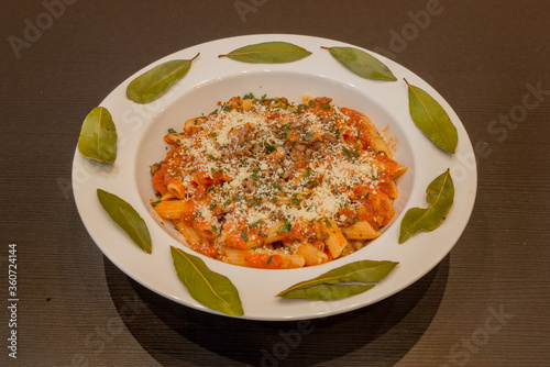 Pasta with Parmesan cheese and Bolognese sauce