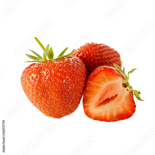 Fresh strawberries whole and half close up isolated on a white