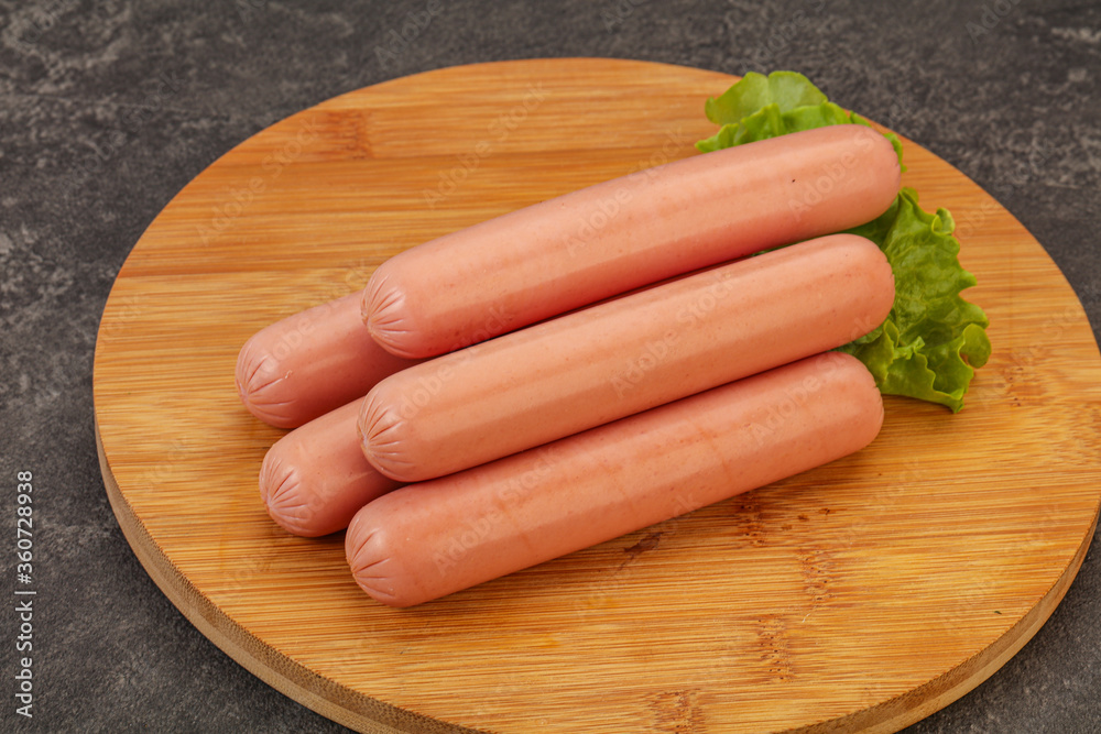 Tasty meat sausages over board Tasty meat sausages over board