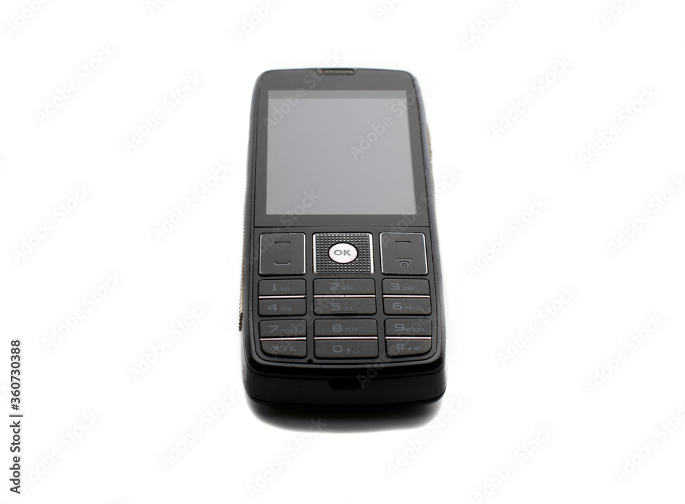 old push-button cell phone on a white background. white background. old push-button cell phone on a white background. white background.