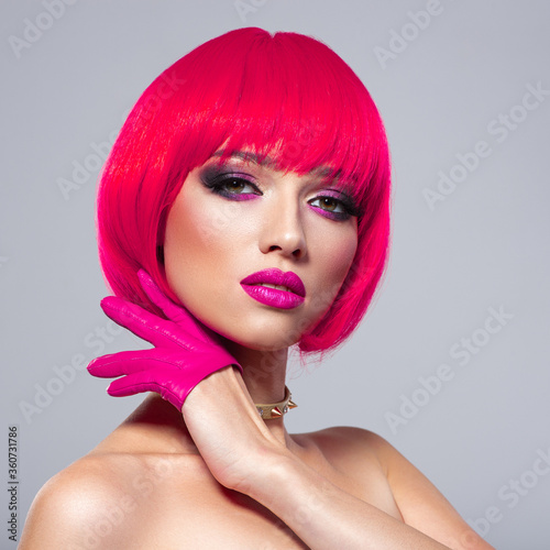 Beautiful young fashion woman with pink lipstick. Glamour fashion model with bright make-up