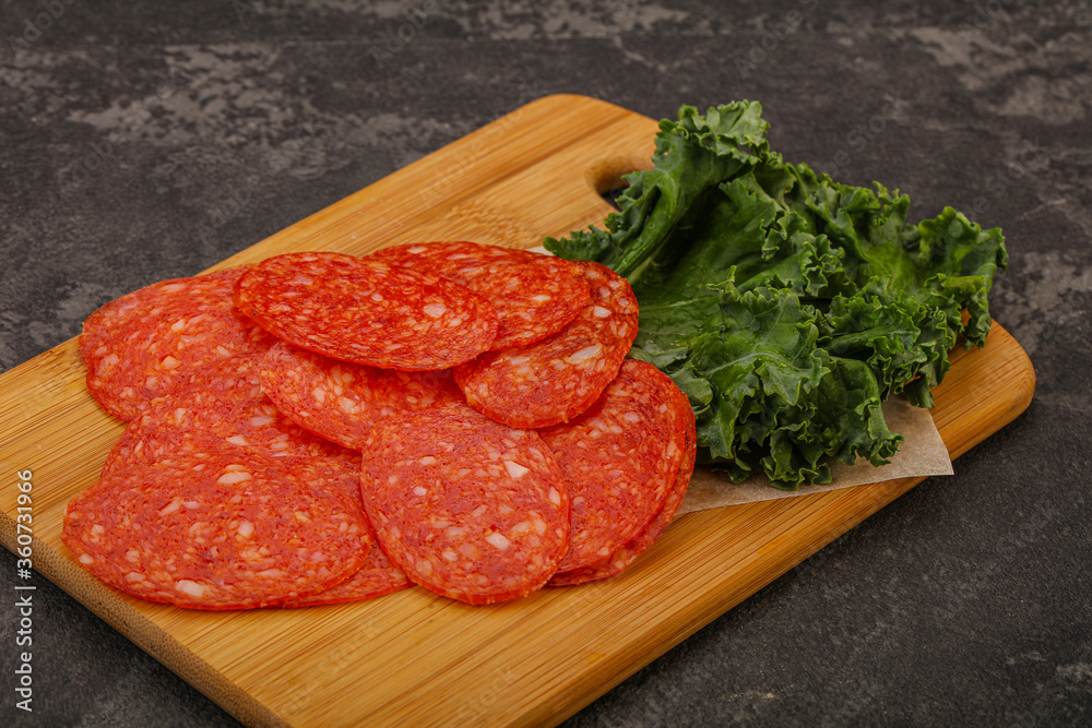 Italian spycy pepperoni sausage slices Italian spycy pepperoni sausage slices