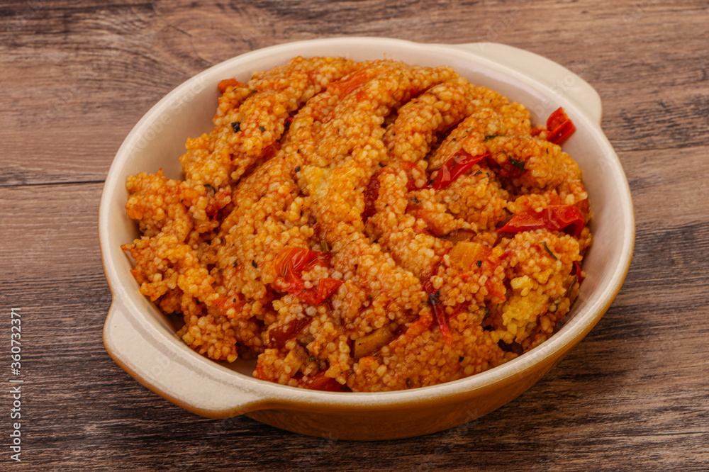 Couscos with tomato and chicken Couscos with tomato and chicken