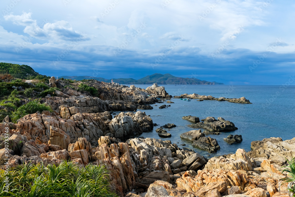 Tropical beach with rocks and blue sea in Vietnam
