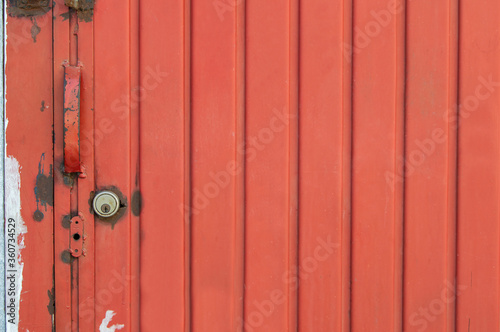 Red rusty metal door, background abstract image © Robert Briggs