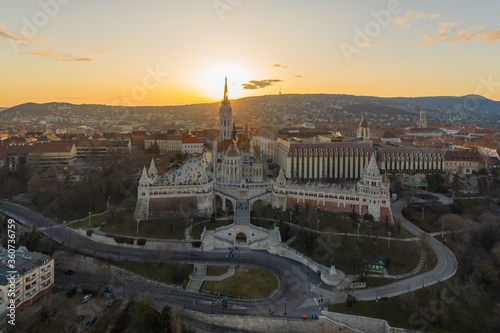 Aerial drone shot of Matthias Church Fisherman's Bastion on Buda Hill in Budapest sunset