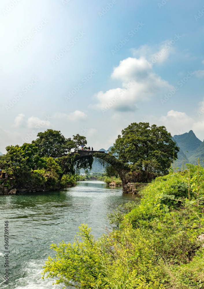  Dragon bridge over Yulong river at Yangshuo, Guangxi, China