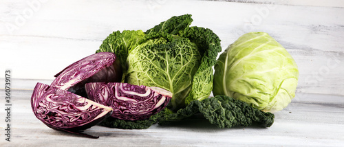 Canvas Print Three fresh organic cabbage heads