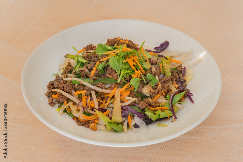 Rice pasta with fresh vegetables and ground beef