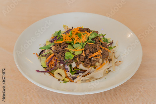 Rice pasta with fresh vegetables and ground beef