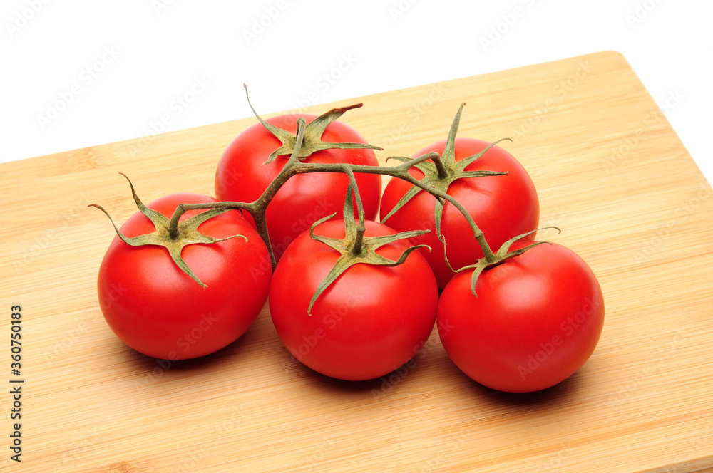 Red tomatoes on white background Red tomatoes on white background
