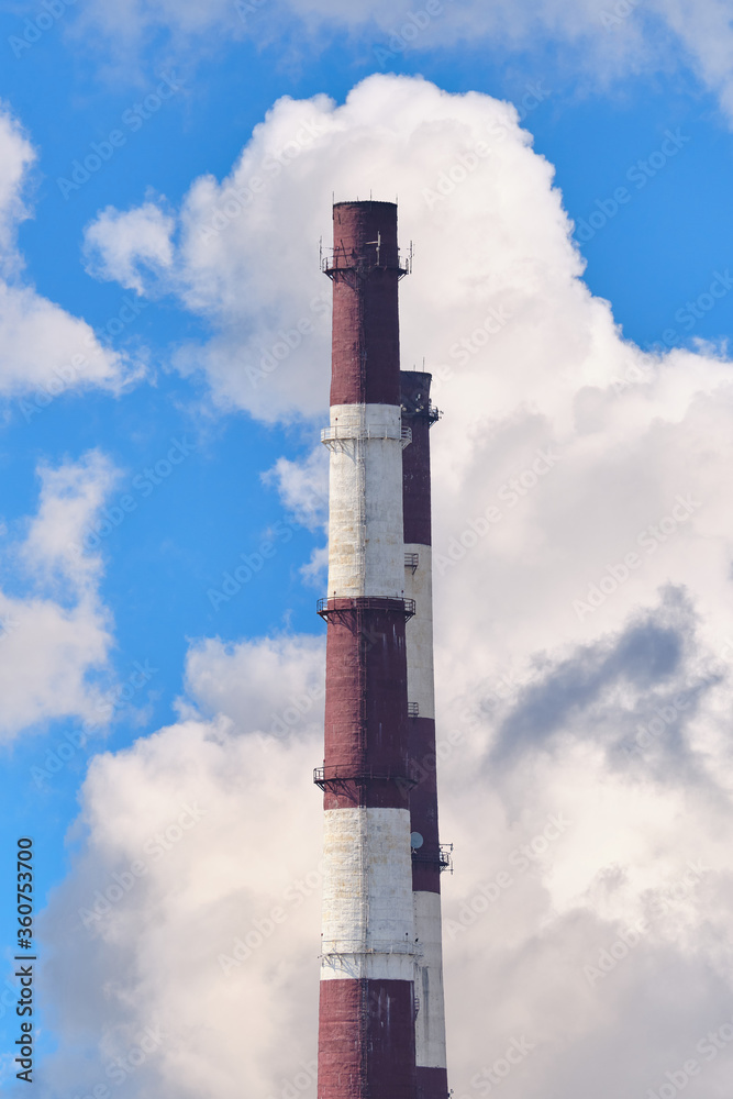 Pipes of an industrial factory on a sky background.