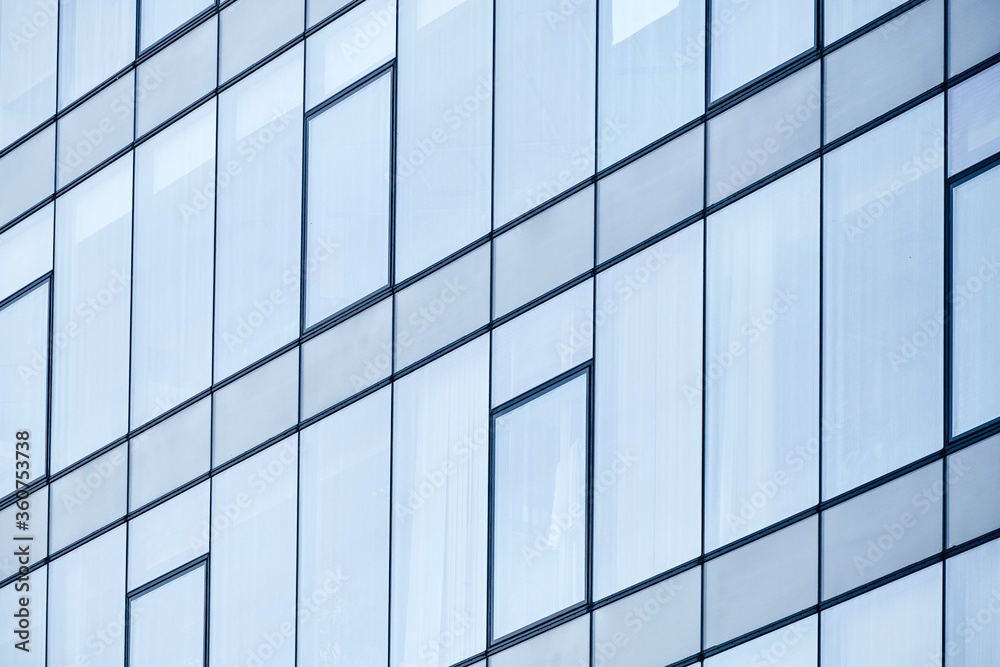 Facade of a modern building from high glass windows. Facade of a modern building from high glass windows.