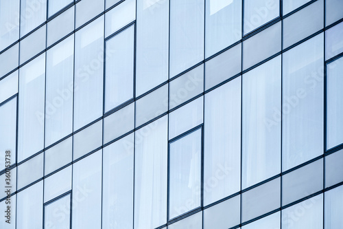 Facade of a modern building from high glass windows.