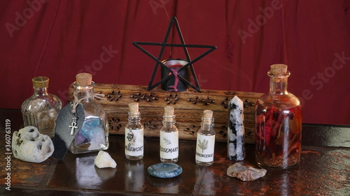 Εκτύπωση καμβά Wiccan altar with potion, pentagram, crystals, traditional herbs in jars, incens