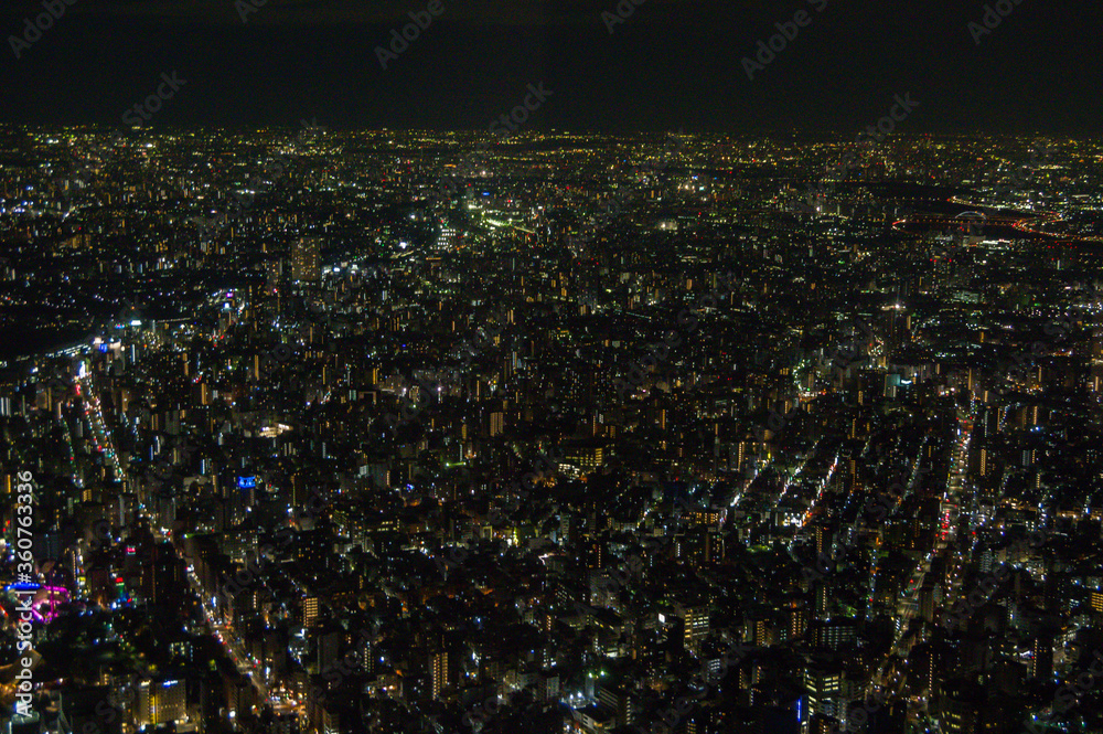 Tokyo city at night, the vast metropolis  spreads out  to the horizon as viewed from the Skytower