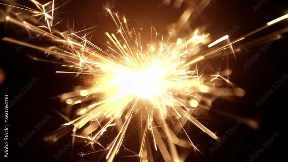 Overhead view of a burning sparkler firework with hot glowing embers. For 4th of July or New years celebration. Overhead view of a burning sparkler firework with hot glowing embers. For 4th of July or New years celebration.