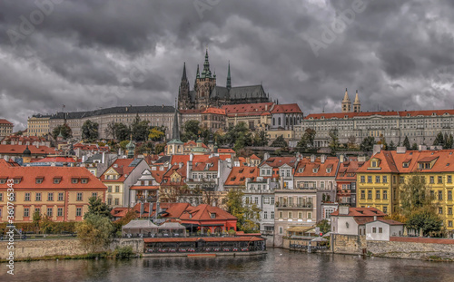 View of Prague and Prague Castle from Vltavas River no people overcast sky