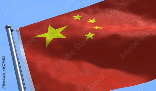 low angle view of CGI 3D China flag waving majestic to the wind under a blue sky in Chinese pride and patriotism concept
