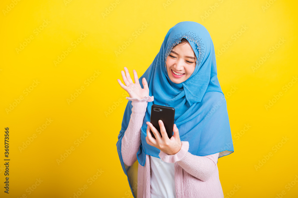 Asian Muslim Arab, Portrait of happy beautiful young woman Islam religious  wear veil hijab funny smile