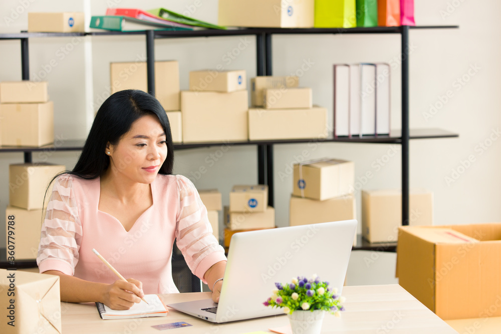Adult woman working online at home. Adult woman working online at home.