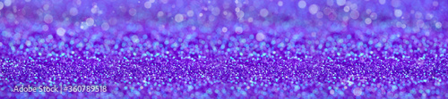 Ultra violet background with shiny bokeh.