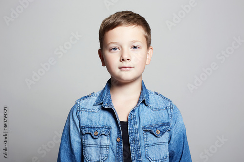 portrait of child. handsome little boy in jeans wear