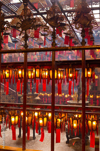 Traditional wooden and glass Chinese lanterns at the Man Mo Temple in Hong Kong