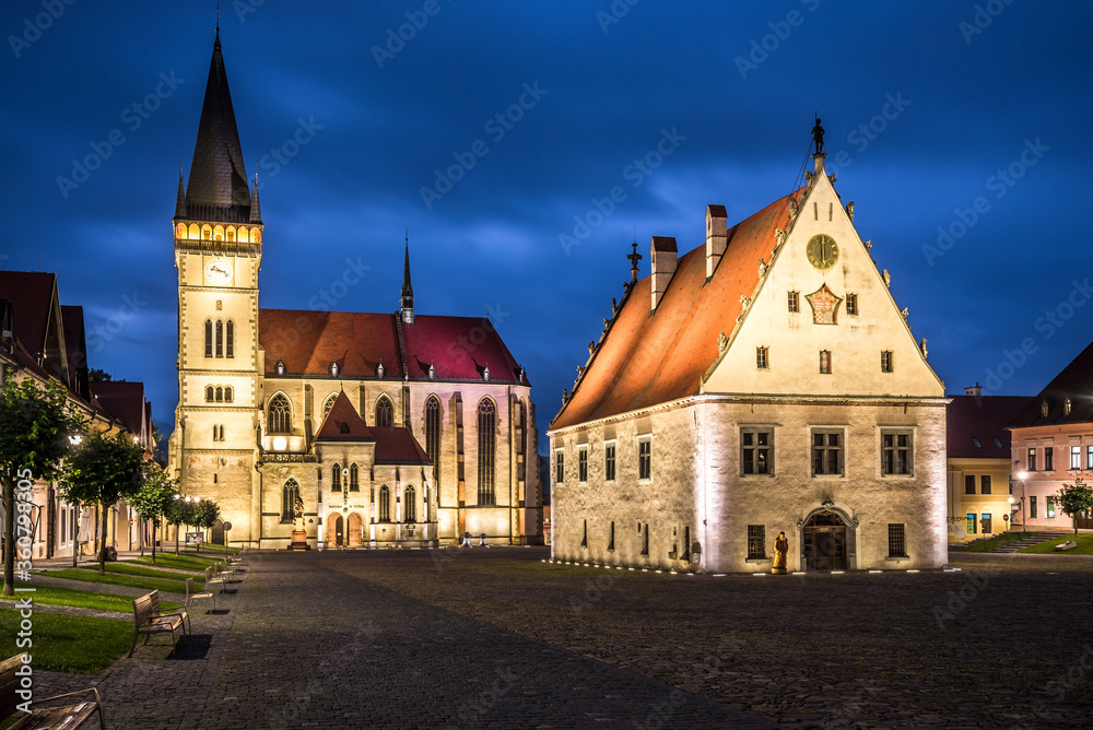 Night view at the Town hall place with Basilica of St.Aegidius and Town hall in Bardejov, Slovakia