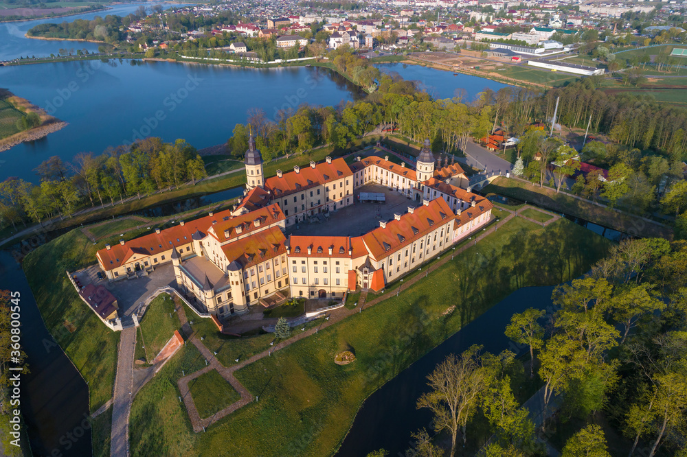 Ancient Nesvizh castle on a sunny May day (aerial photography). Nesvizh, Belarus