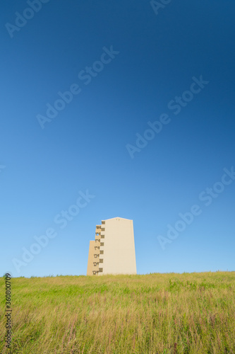 modern building in a grass field